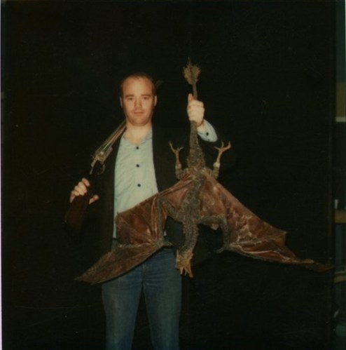 Tippett jokingly poses with one of the 'flying' Dragon models.